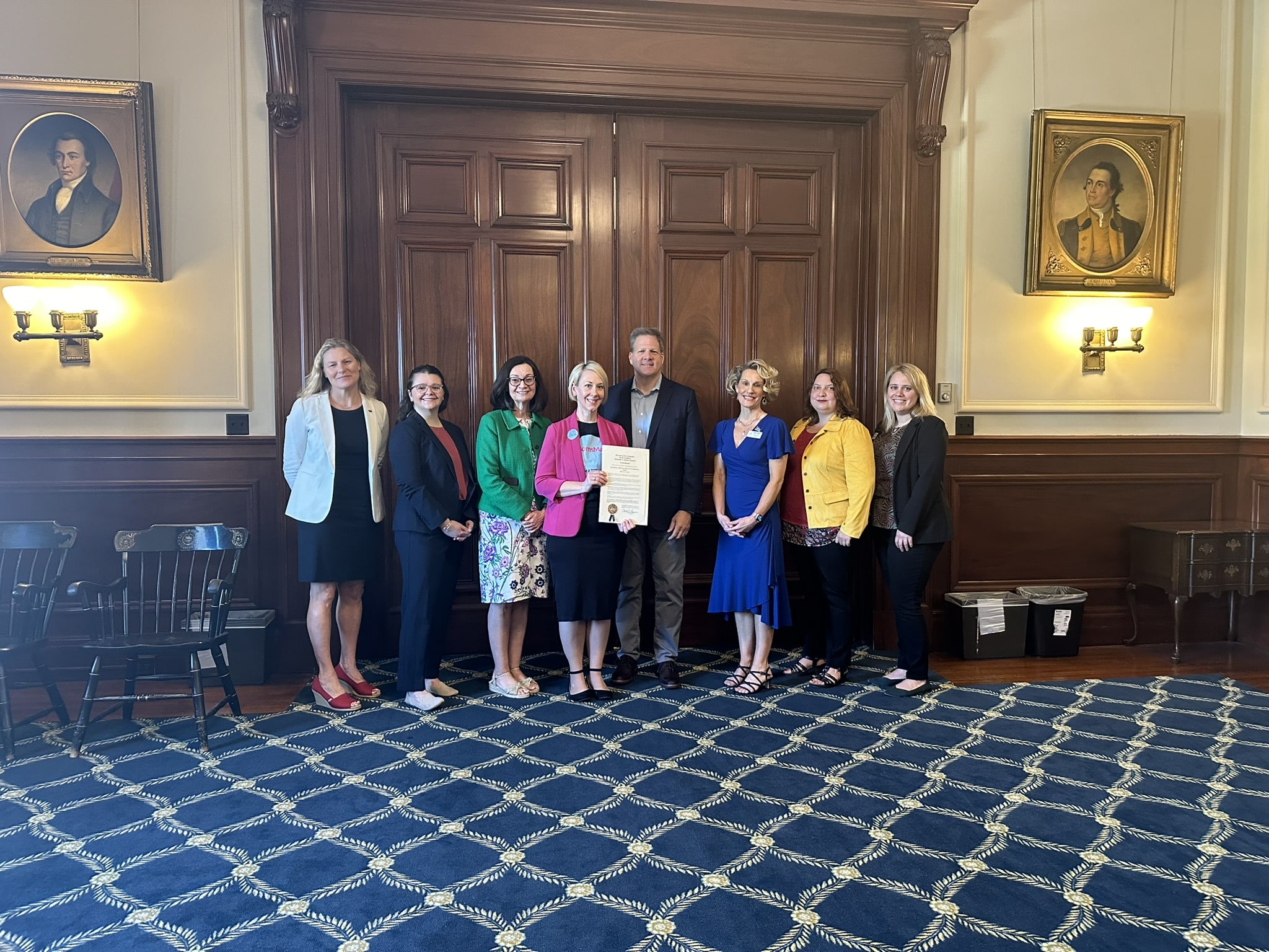 Advocates_with_Sununu_LOOKING_AT_CAMERA.JPEG